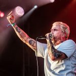 Joe Talbot of IDLES shouting into the mic during their Shaky Knees 2025 Day 1 performance – concert photo by Greeblehaus.com