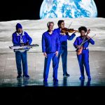 David Byrne on stage with band Bellco Theatre Denver live music