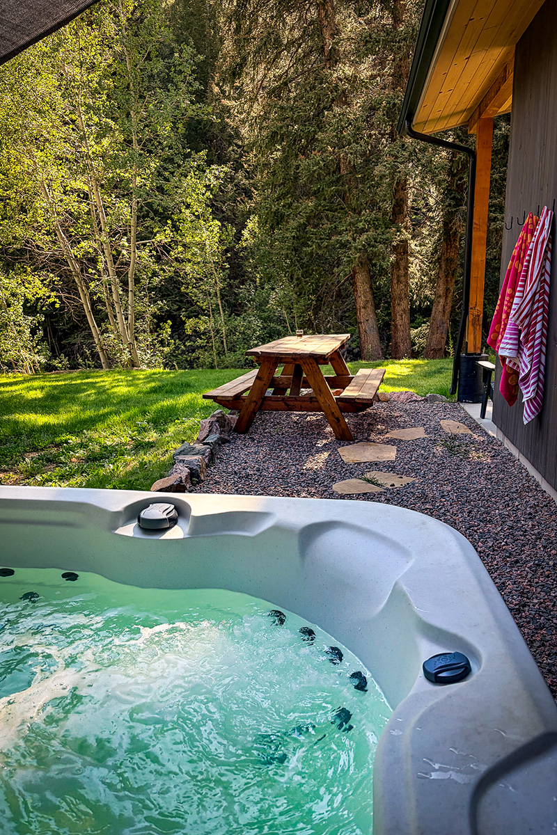 Private cabin hot tub at Lostfork Basecamp near Denver, Colorado
